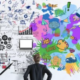 An illustration showcasing the balance between creativity and cybersecurity, with a person observing a colorful representation of ideas and digital technology, symbolizing the protection of creative assets through robust cybersecurity solutions